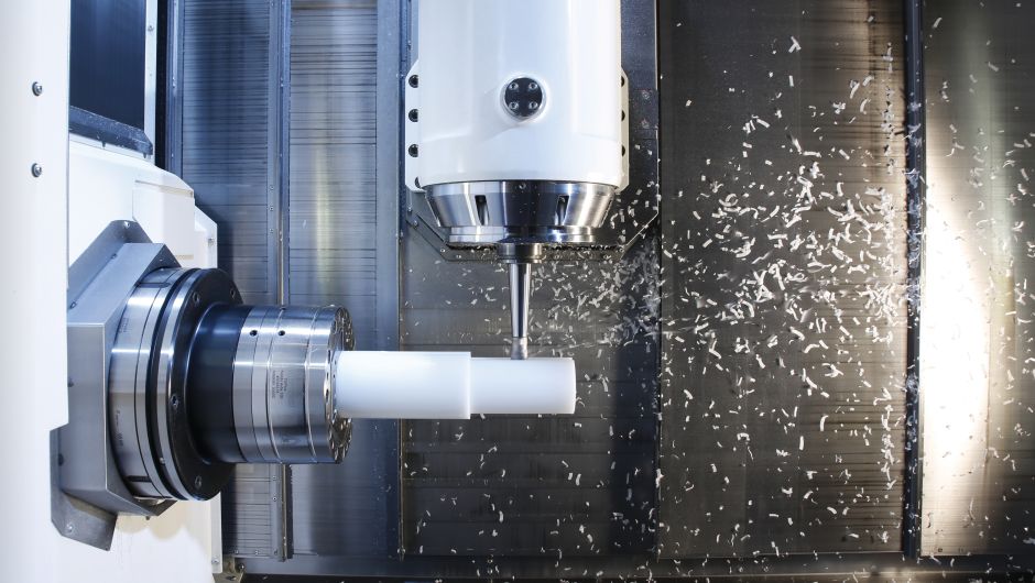A plastic part that is currently being machined by milling