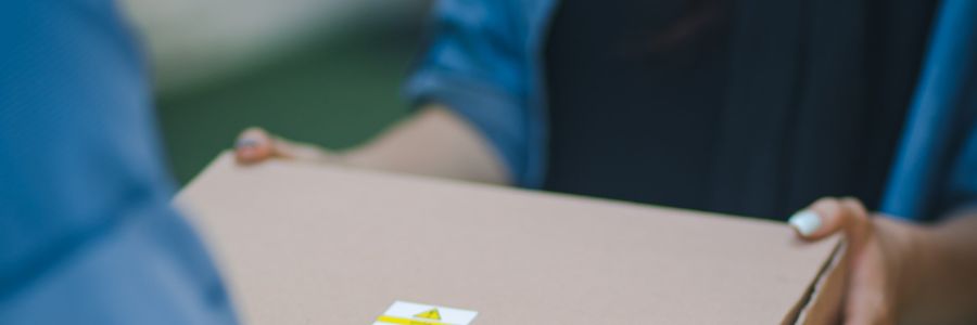 A package is handed over to a courier